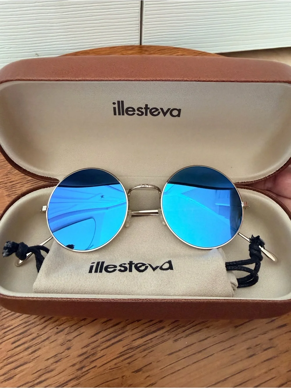 Illesteva Porto Cervo Round Silver Frame Sunglasses with Blue Mirrored Lenses